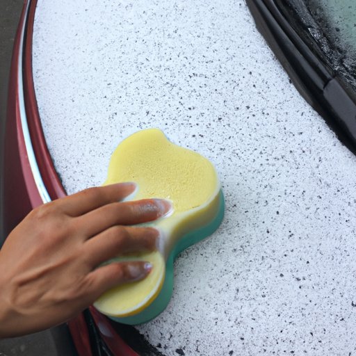Use a Sponge to Gently Scrub the Car